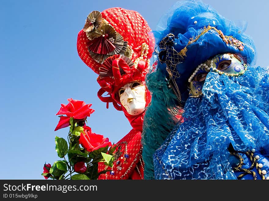 Two people in costume at the Venice Carnival