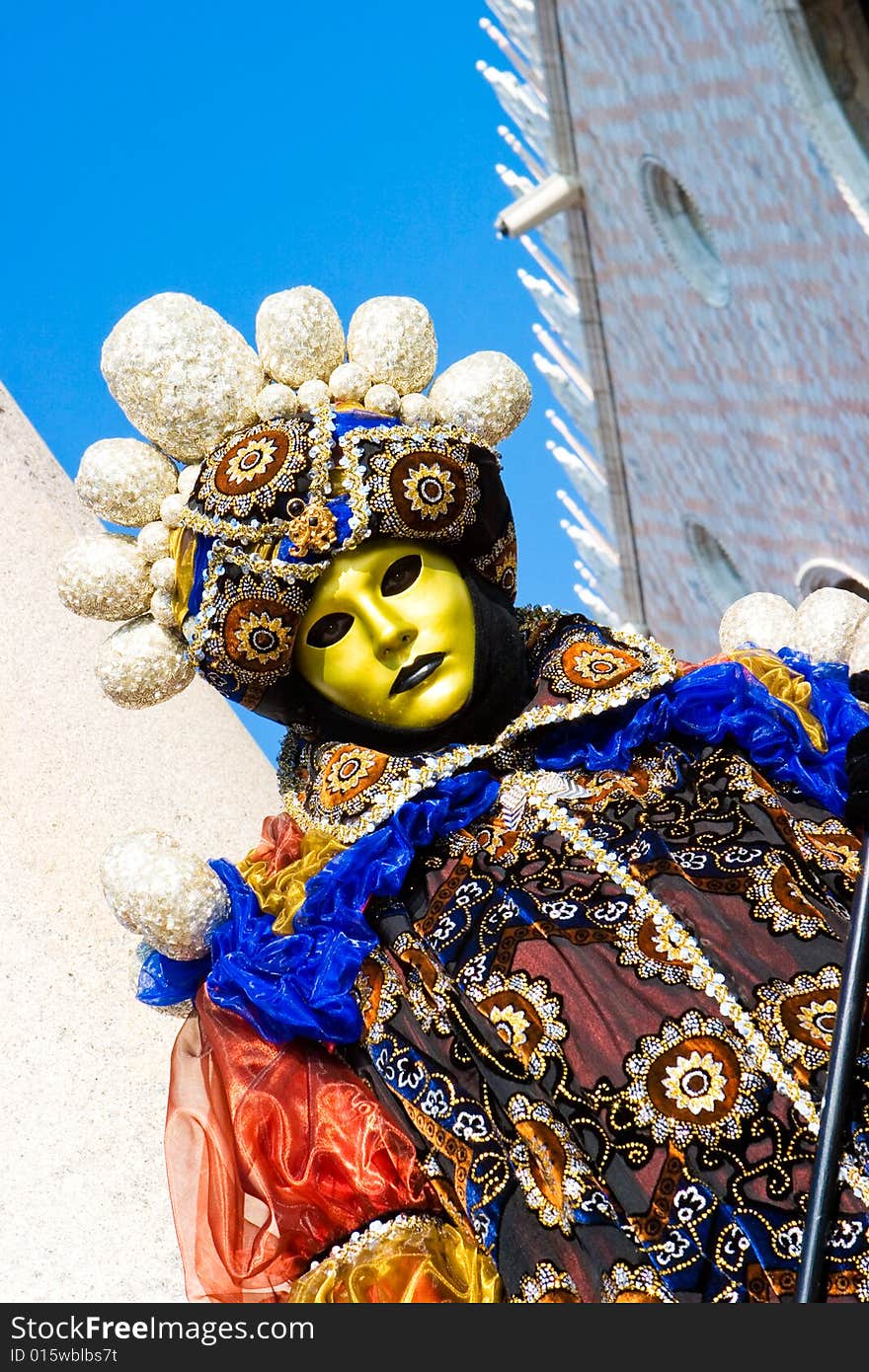 A man in Venetian costume standing in St. Mark's Square, Venice (2). A man in Venetian costume standing in St. Mark's Square, Venice (2)