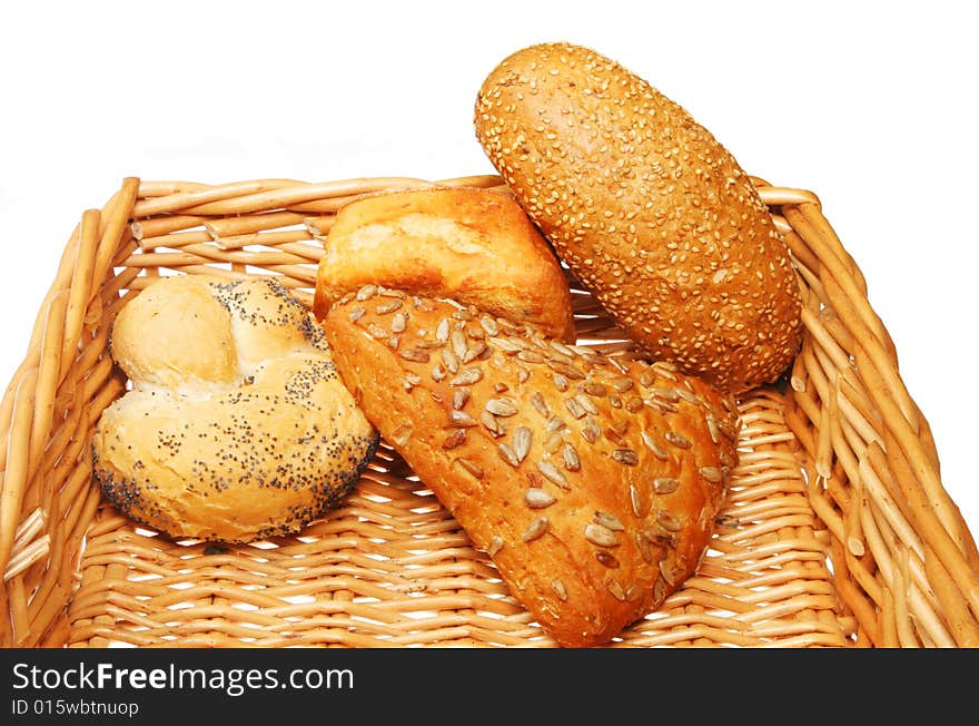 Assorted bread rolls in a wicker basket. Assorted bread rolls in a wicker basket