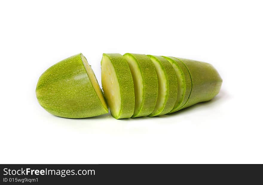 Raw cut zucchini isolated on white background