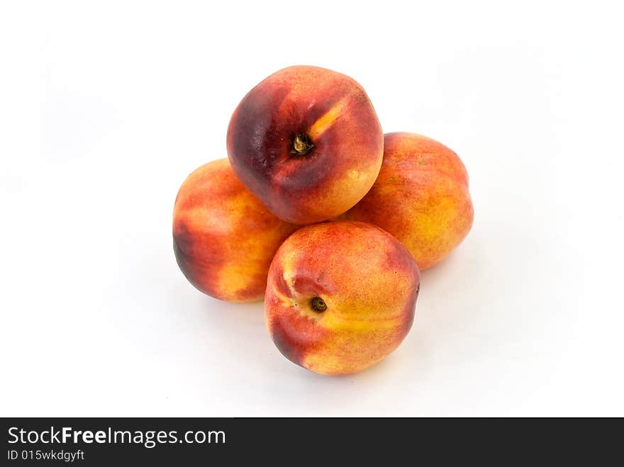 Fresh nectarine on white background.