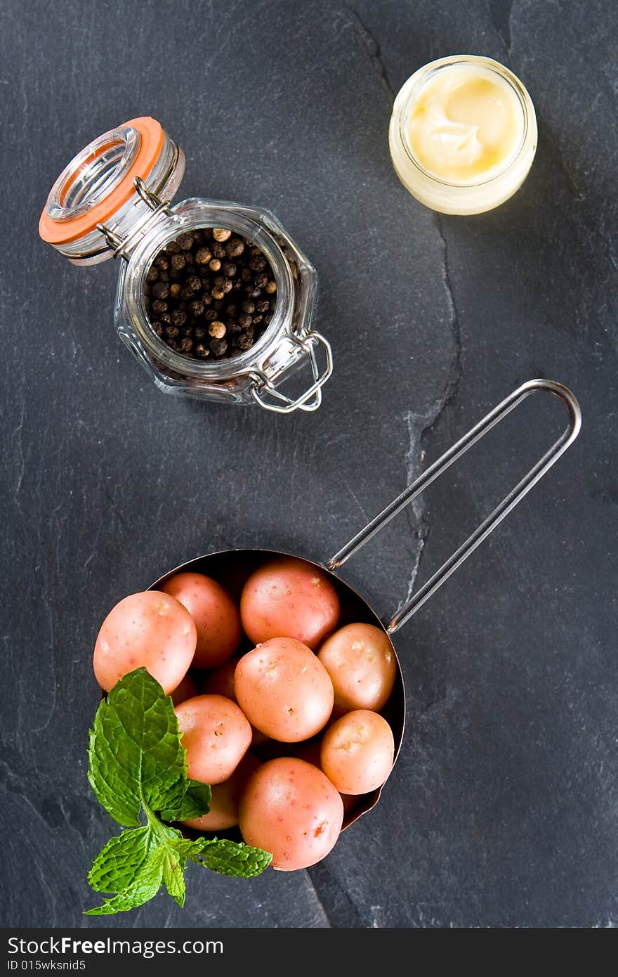 New potatoes with butter and pepper