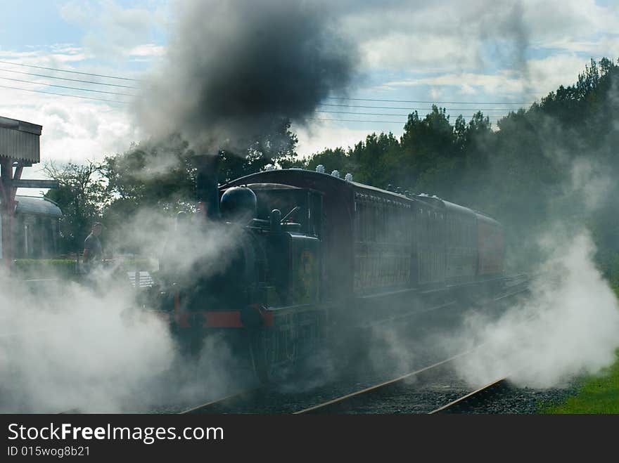 An atmospheric shot of a Steam engine leaving Bodiam Station on the Kent and East Sussex Railway bound for Tenterden in Kent. An atmospheric shot of a Steam engine leaving Bodiam Station on the Kent and East Sussex Railway bound for Tenterden in Kent