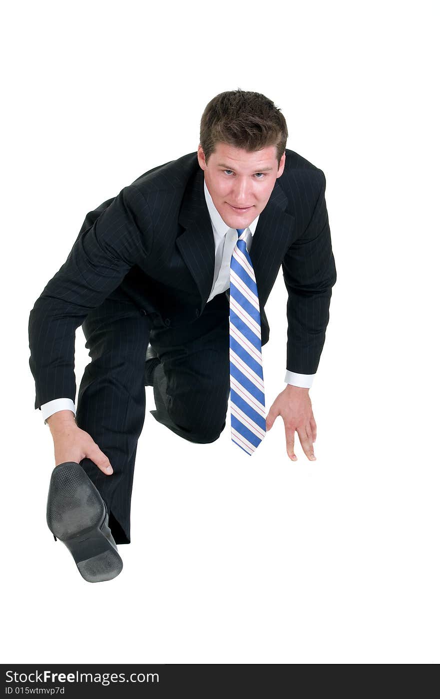 Young businessman stretches and gets ready for the day