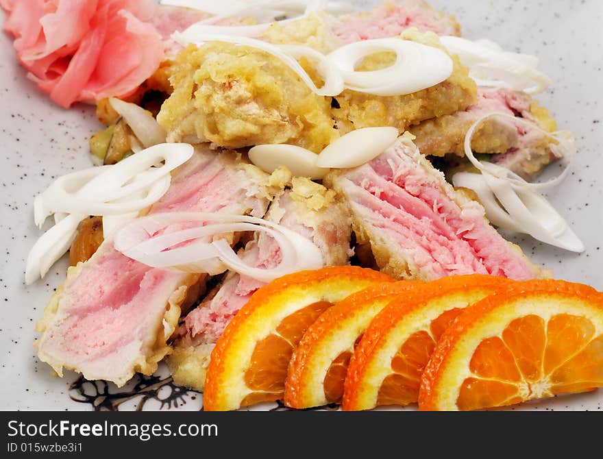 Japan Salad from Tuna Fish, Rice, Vegetables and Orange Slice. Isolated on White Background