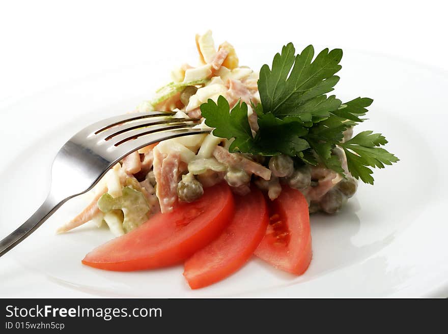 Salad Comprises Smoked Chicken and Celery Dressed with Parsley and Tomato Slice. Isolated on White Background. Salad Comprises Smoked Chicken and Celery Dressed with Parsley and Tomato Slice. Isolated on White Background