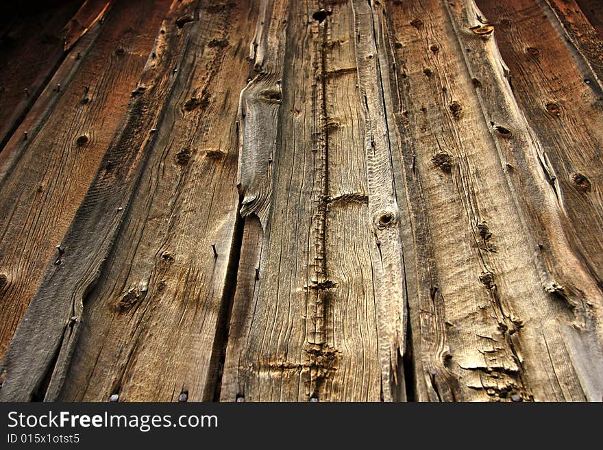 Texture shot of old gnarled wood from 19th century cabin. Texture shot of old gnarled wood from 19th century cabin