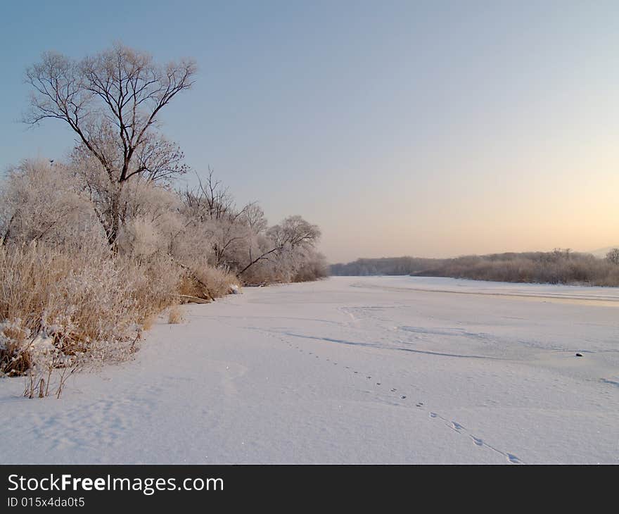 On ice of the frozen river