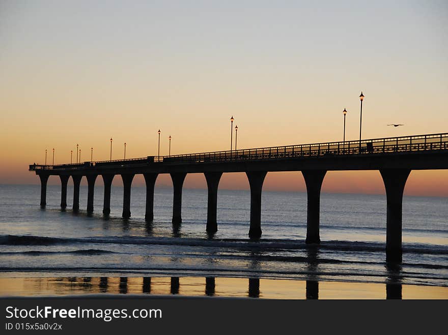 Sunrise at New brighton pier, New Zealand.