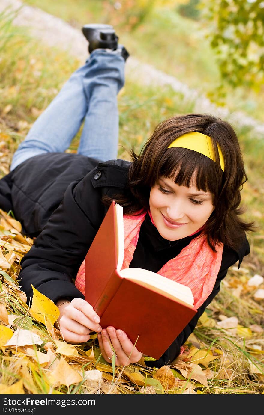 Pretty girl reading a book