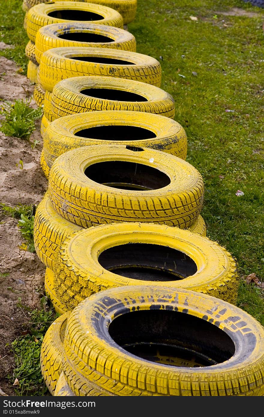 Yellow old tyres textured background