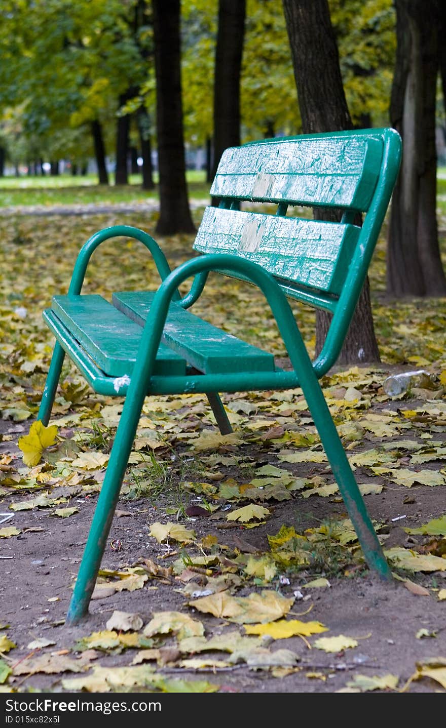 Green bench in park