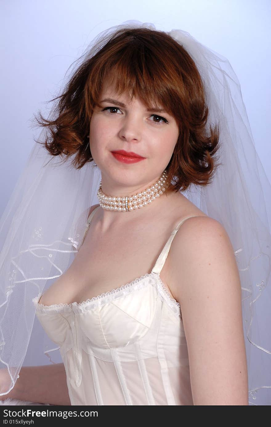 Cute retro fifties bride in lingerie