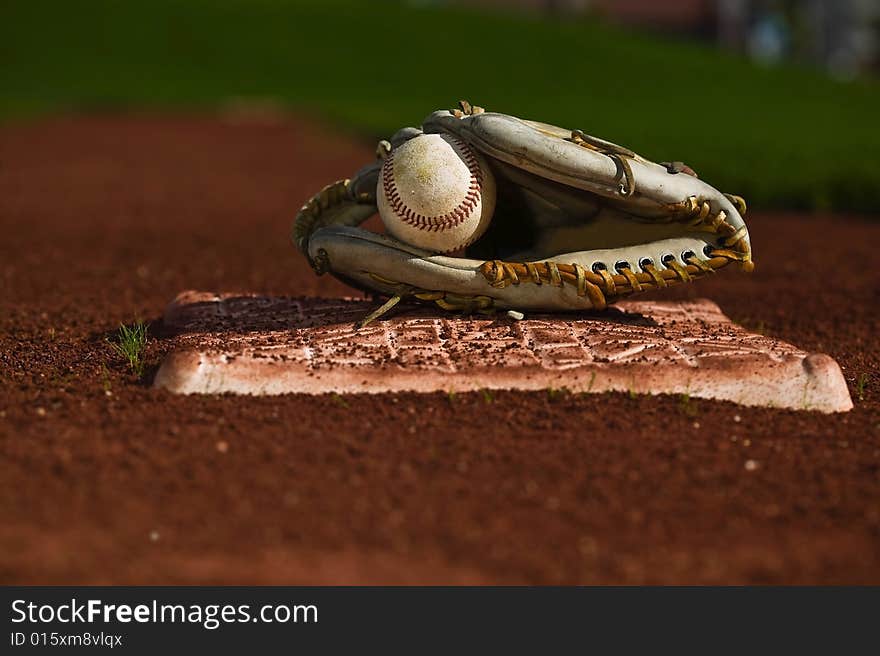 Baseball In Glove On The Field