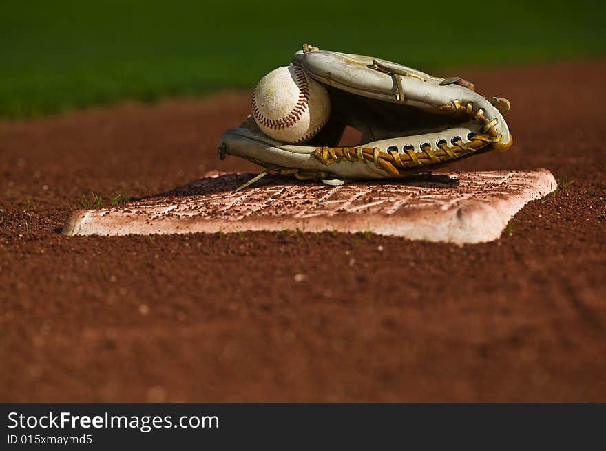 Baseball In Glove On The Field