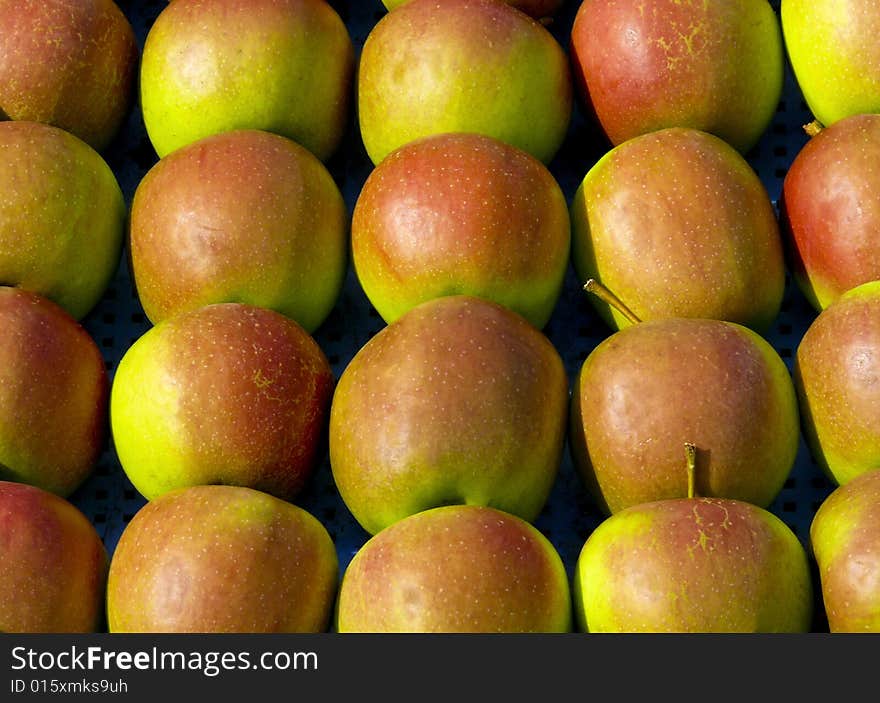 Apple's background - ideal rows of fruits. Apple's background - ideal rows of fruits