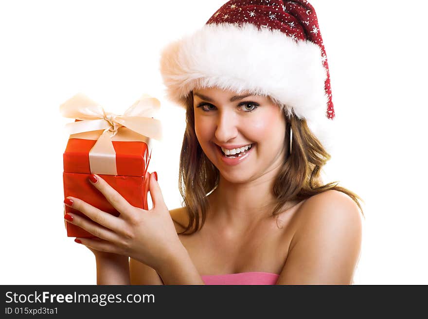 Winter portrait of a beautiful young smiling woman with a christmas cap. Winter portrait of a beautiful young smiling woman with a christmas cap