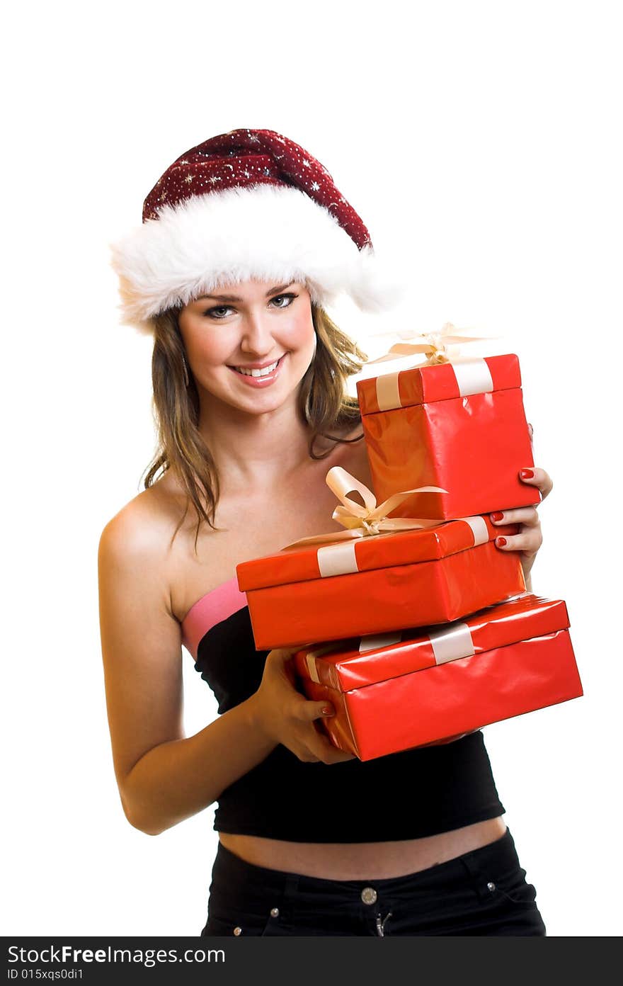 Winter portrait of a beautiful young smiling woman with a christmas cap. Winter portrait of a beautiful young smiling woman with a christmas cap