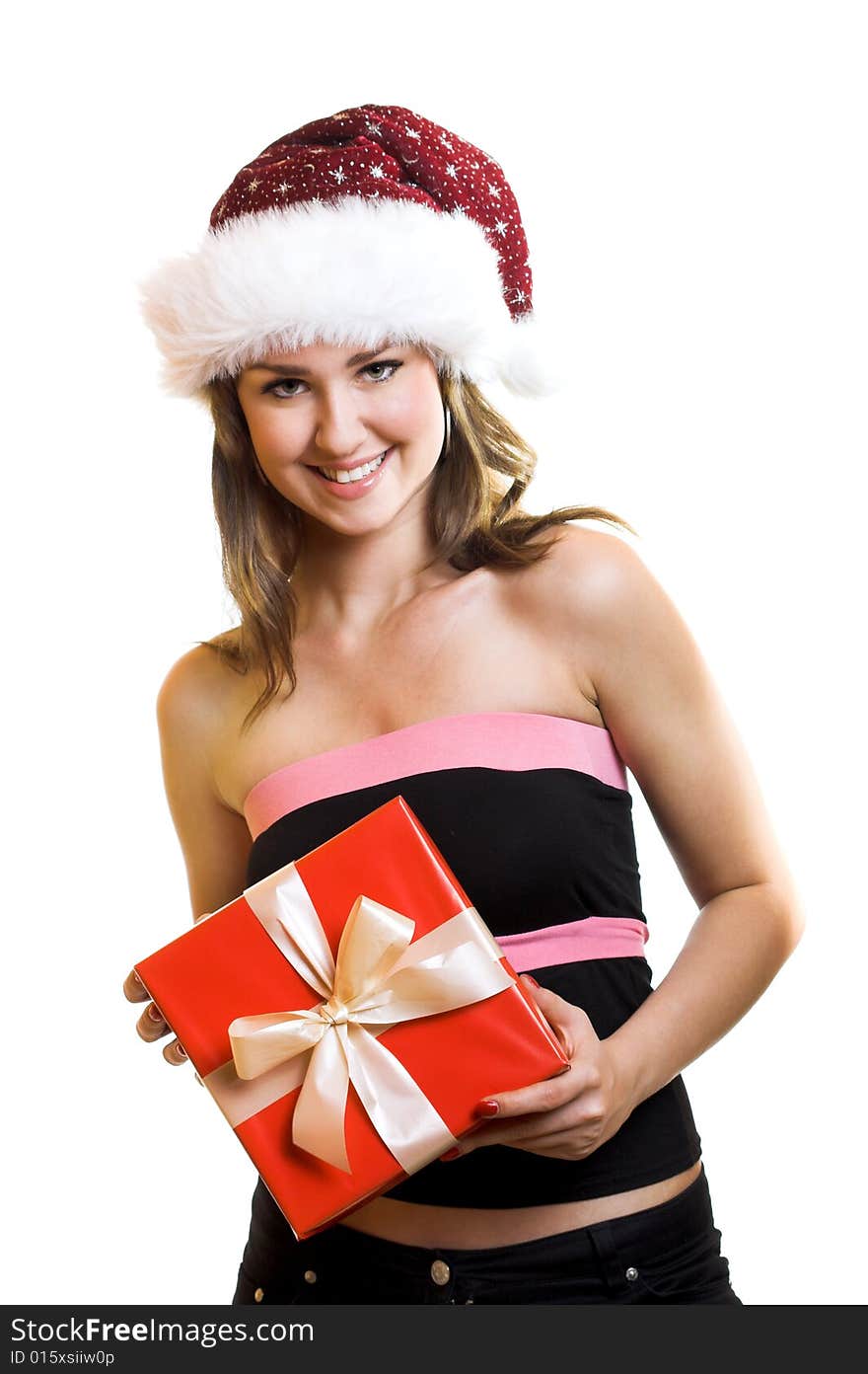 Winter portrait of a beautiful young smiling woman with a christmas cap. Winter portrait of a beautiful young smiling woman with a christmas cap