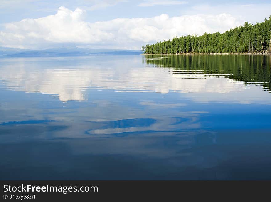 Quiet evening on high-mountainous lake. Quiet evening on high-mountainous lake