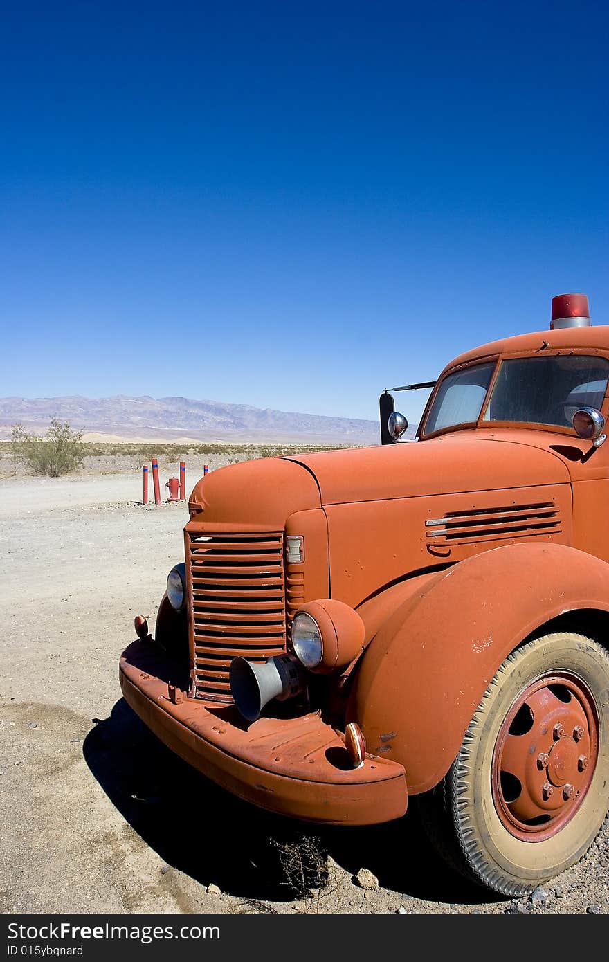 Red car in the desert