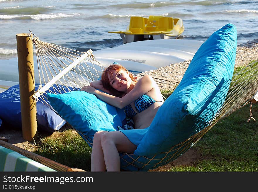 Girl sitting on hammock