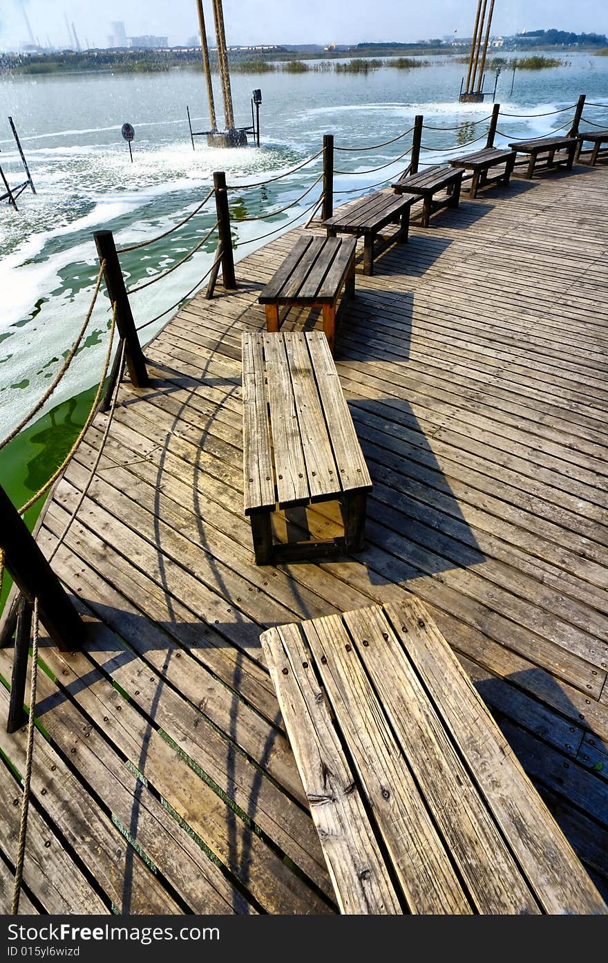 Bench on lake shore