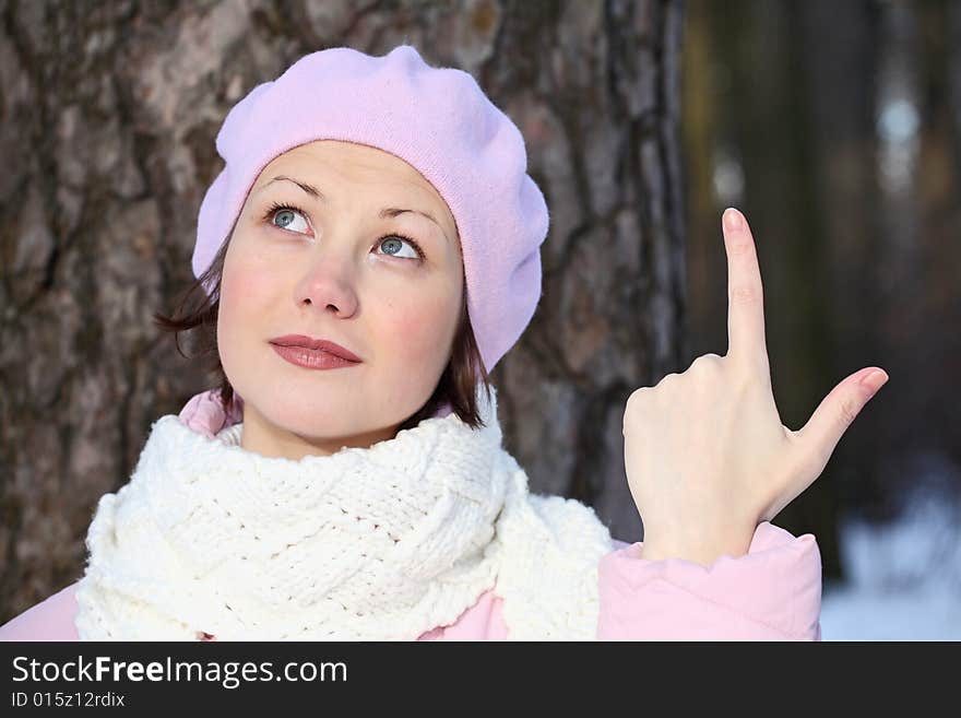 Smiling girl in pink beret with opinion