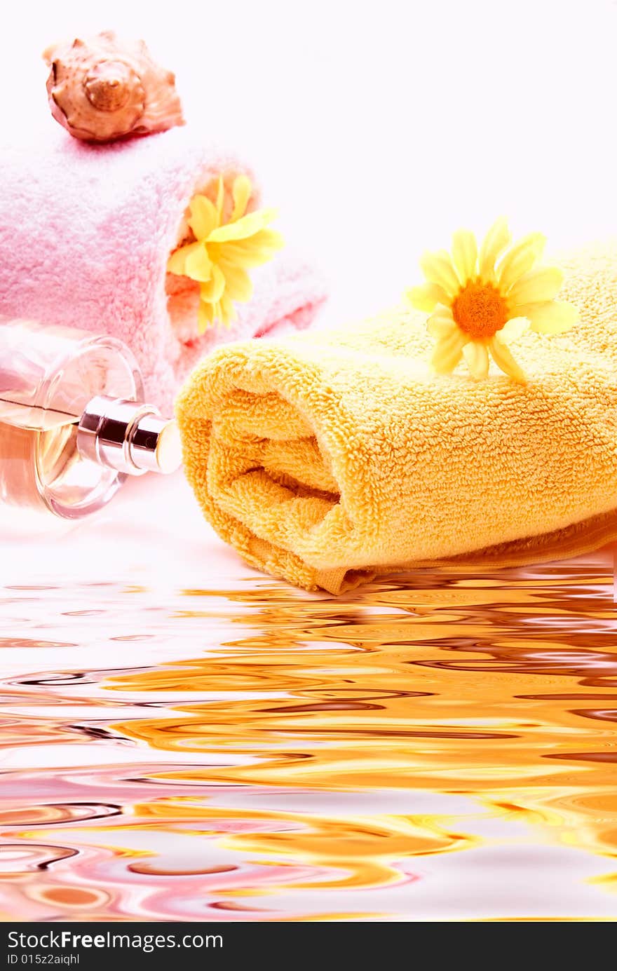 Bath towels with flowers and seashell