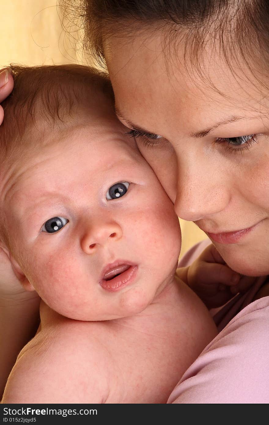 Happy mother with baby boy 3 month old