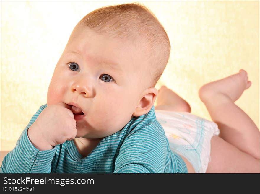 Baby experiencing erupting tooth