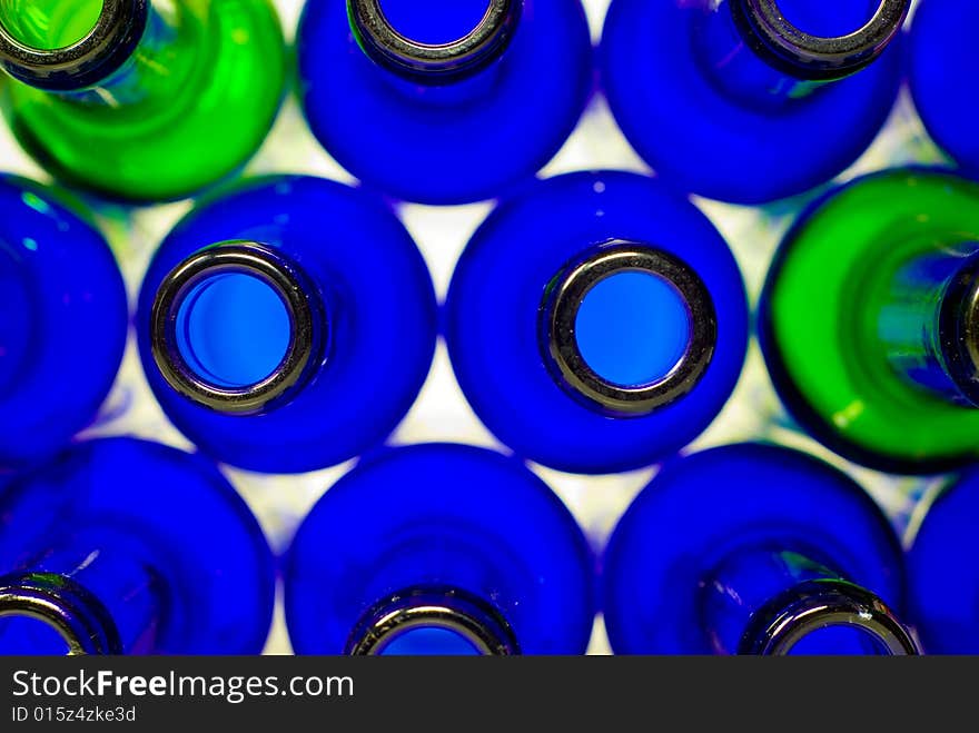 A shot of some blue and green bottles in transmitted light. A shot of some blue and green bottles in transmitted light