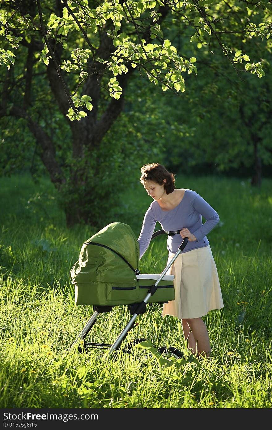 Mother with baby carriage