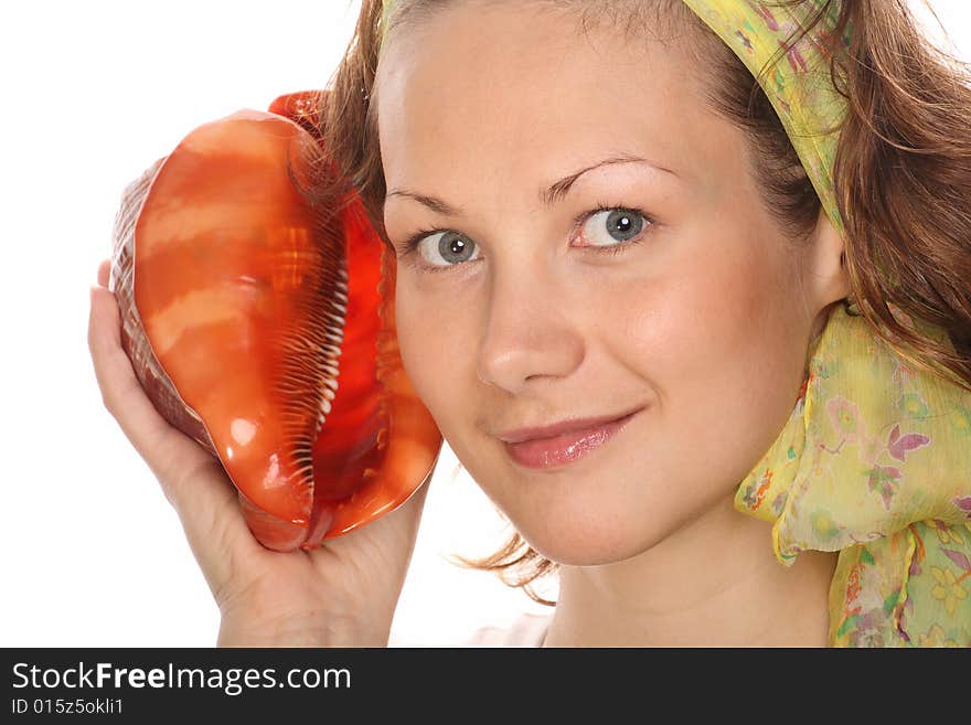 Portrait of Beautiful model with green headscarf and red sea shell