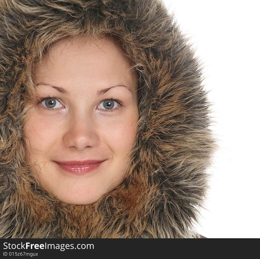 Beautiful girl with blue eyes in fur hood. Beautiful girl with blue eyes in fur hood