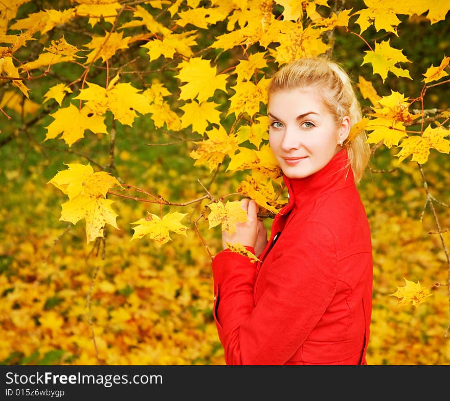 Woman in autumn forest