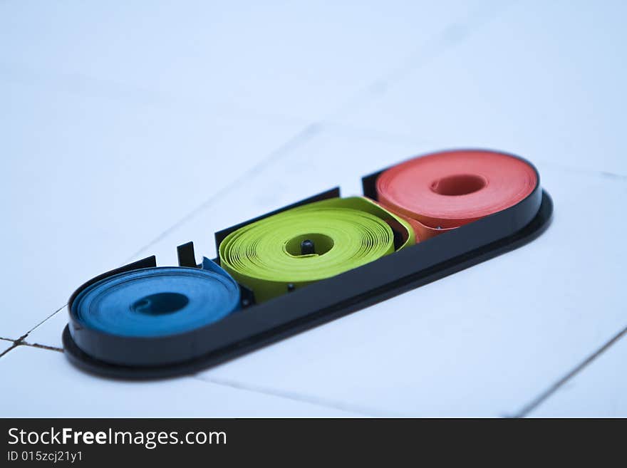 Indicator paper on a faience lab desk.