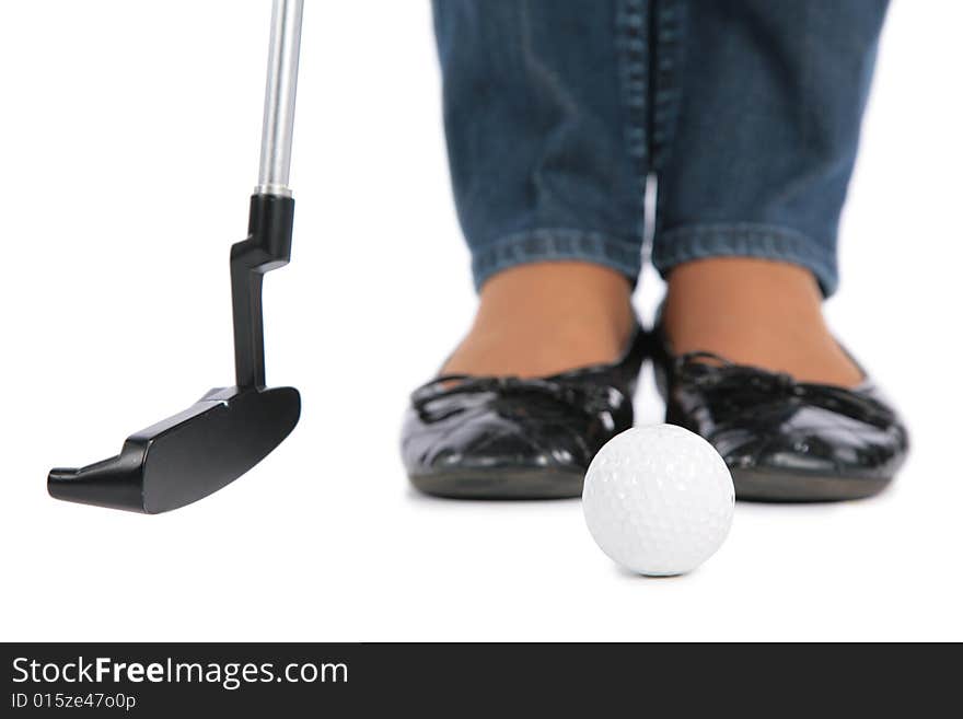 Woman Feet, stick and ball for golf