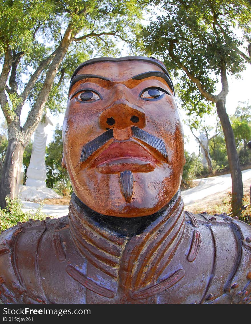 Chinese soldier, Terracotta warrior, Part of a Chinese army in the garden for orient Qta. of Loridos, Bombarral, Portugal. Chinese soldier, Terracotta warrior, Part of a Chinese army in the garden for orient Qta. of Loridos, Bombarral, Portugal