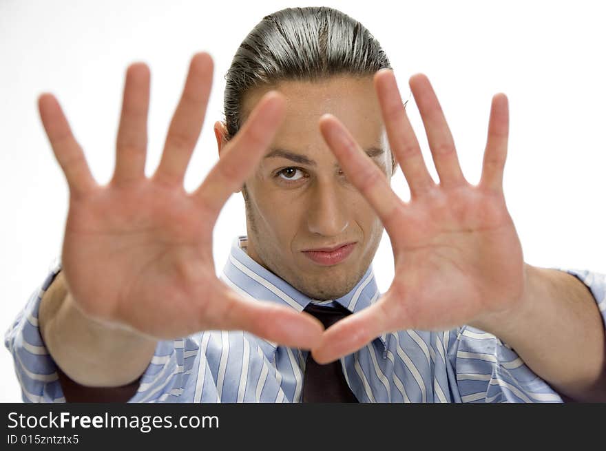 Close up view of young man posing with open palms