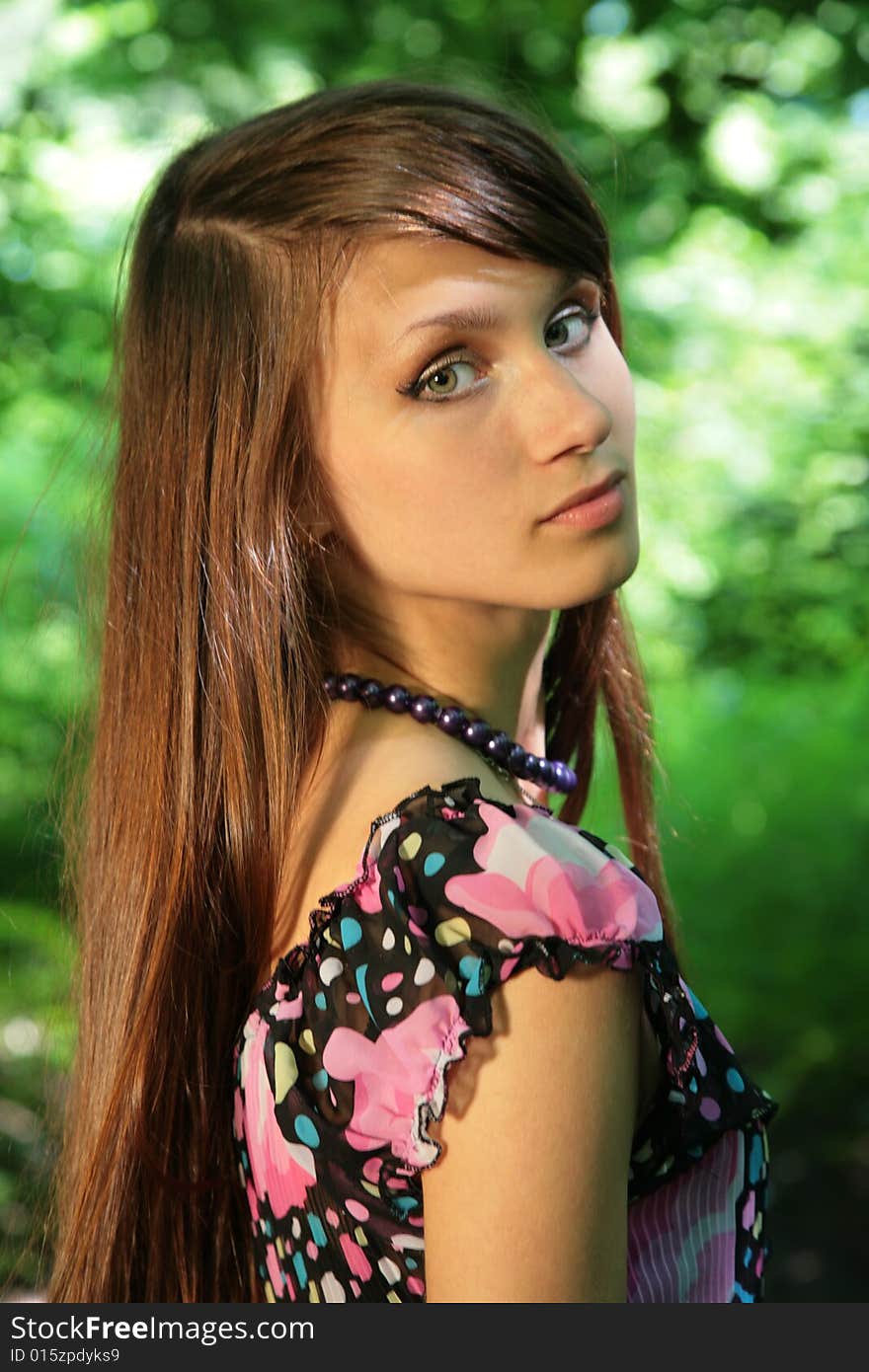 Young Beauty Girl In Wood