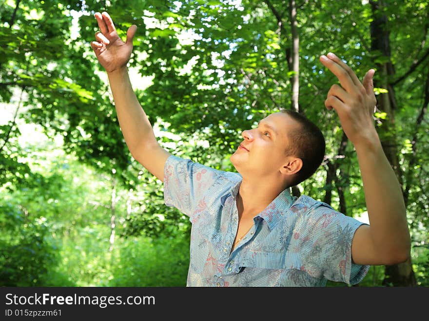 Guy With Rised Hands Like A Director Of Birds