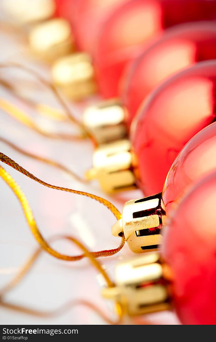 Macro row of red christmas balls