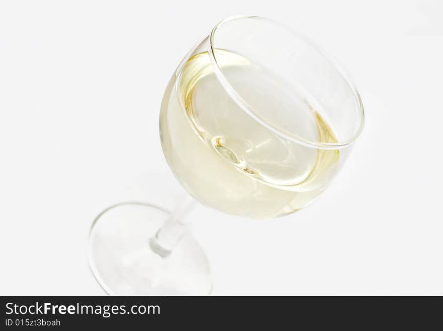 An isolated glass of wine over white background