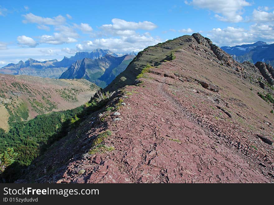 A red color mountain peak on Carthew-Alderson Trail in Waterton National Park Alberta Canada. A red color mountain peak on Carthew-Alderson Trail in Waterton National Park Alberta Canada