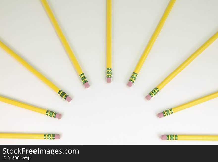 Pencils forming a sun with space for text. Pencils forming a sun with space for text.