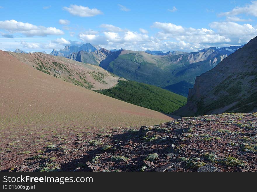 A red color mountain peak on Carthew-Alderson Trail in Waterton National Park Alberta Canada. A red color mountain peak on Carthew-Alderson Trail in Waterton National Park Alberta Canada