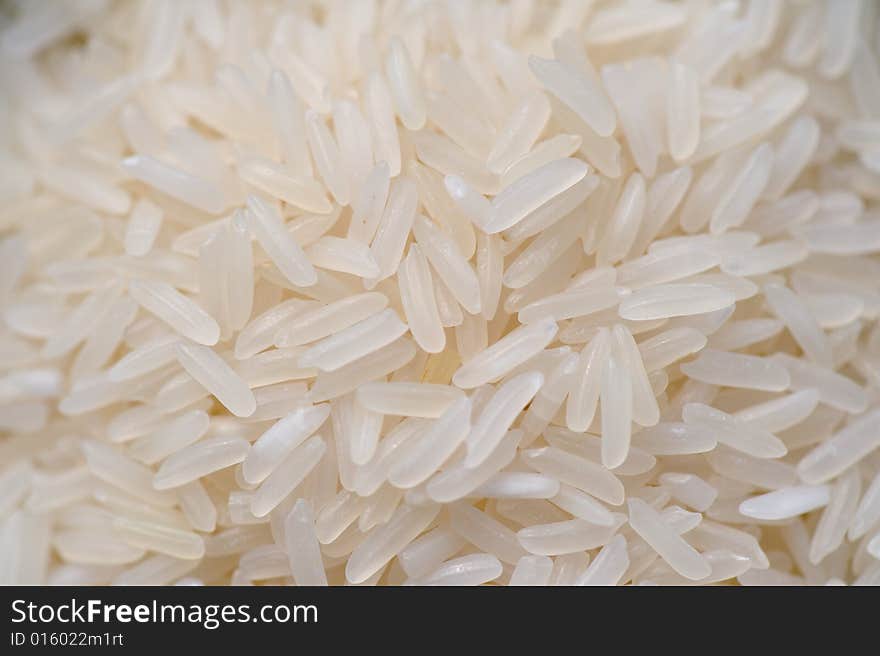 A close up macro image of white rice. A close up macro image of white rice