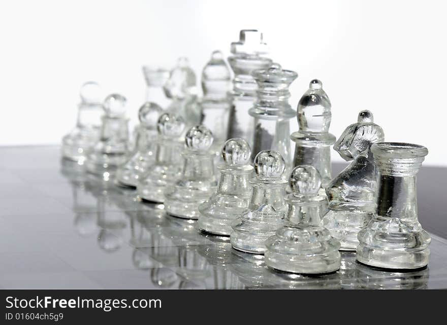 An image of a glass chess set. An image of a glass chess set