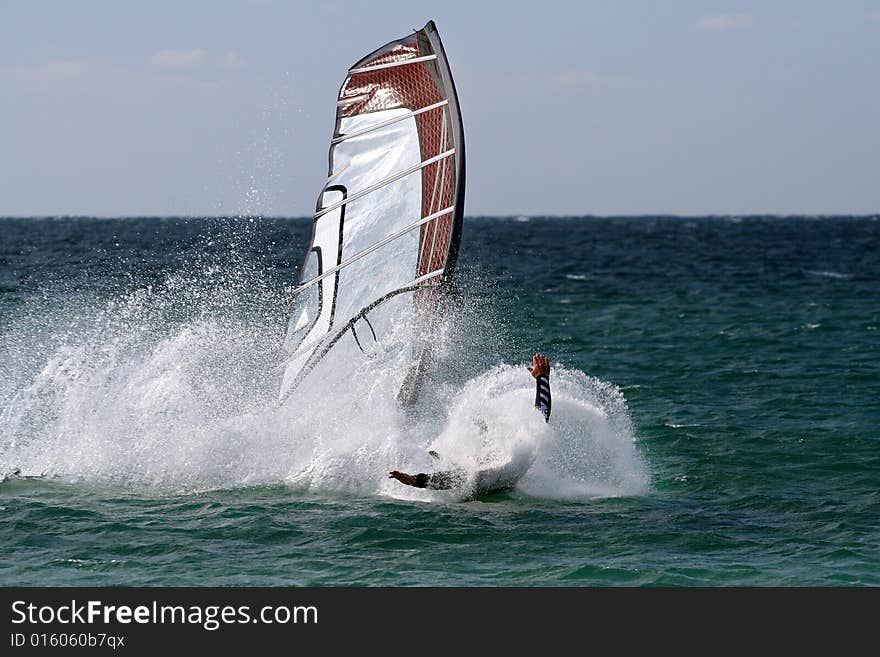 Wind surfer. Windsurfers surfing the waves in the Turkey-Surf-Gokceada. Wind surfer. Windsurfers surfing the waves in the Turkey-Surf-Gokceada